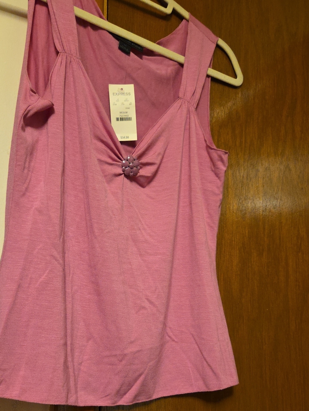JUNIORS Express Pink Sleeveless Tank Top with Flower Accent